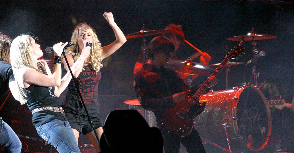 Jamelle (left) performs with Carrie Underwood at the 2008 Stagecoach Country Music Festival. (Photo: Tonya Wise/London Ent / Splash/Newscom)