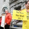 William Butkus and a dozen other protesters of the Trump administration's executive order demonstrate Tuesday outside the 9th Circuit Court of Appeals in San Francisco. (Photo: Noah Berger/Reuters/Newscom)