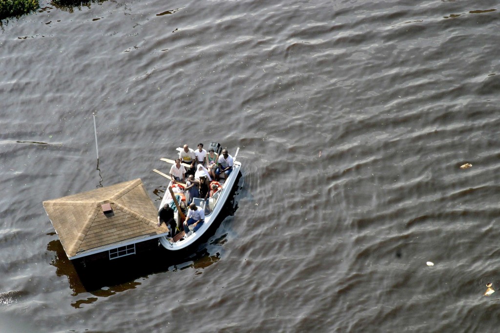 Flood victims in the 9th ward are rescued by a US Coast Guard helicopter. The Coast Guard saved 34,000 people in the city of New Orleans alone. (Photo: Bartlett/SIPA/Newscom)