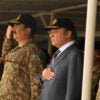 Pakistan's Prime Minister Nawaz Sharif, second from right, stands with military leaders while watching military exercises in Bahawalpur, Pakistan, Nov. 16, 2016. (Photo: Stringer/Reuters
/Newscom)