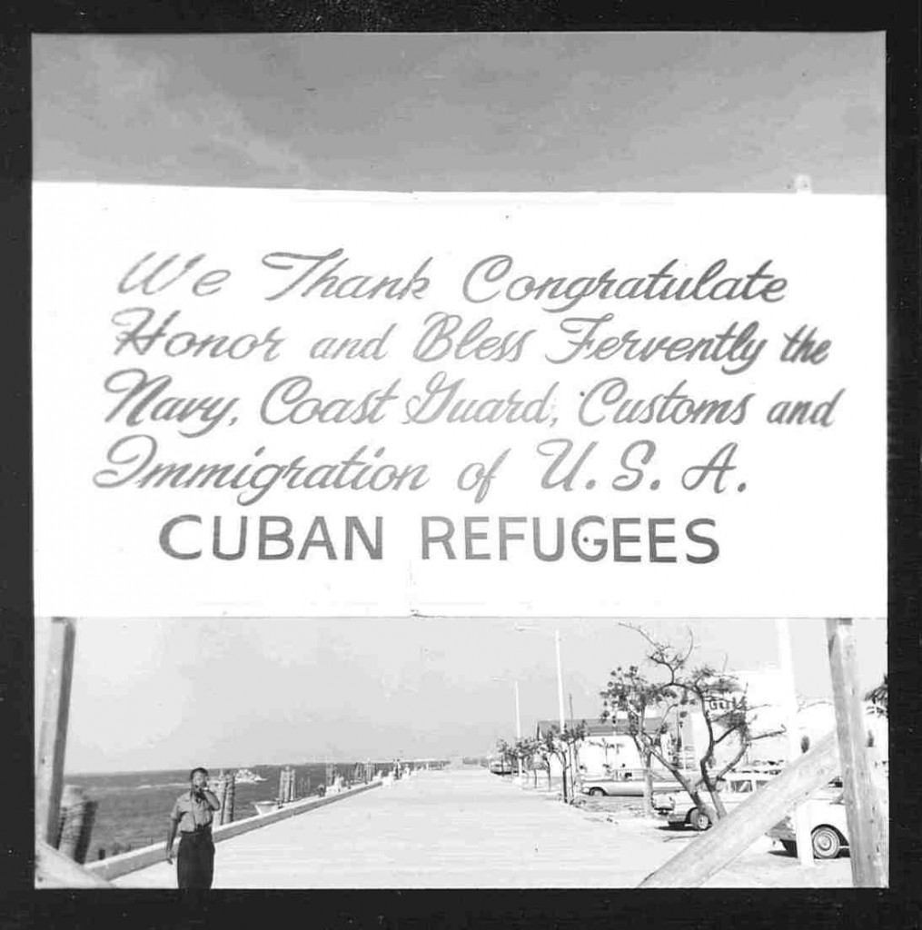 In 1965, the United States welcomed refugees with open arms, sending the Navy and Coast Guard to their rescue. In this photo, Cuban refugees show their thanks. (Photo: U.S. Coast Guard Camarioca Boatlift Collection)