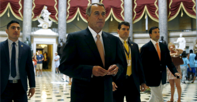 House Speaker John Boehner walks to the House Chamber for a vote on a package of trade bills in the U.S. Capitol on June 12. (Photo: Newscom)