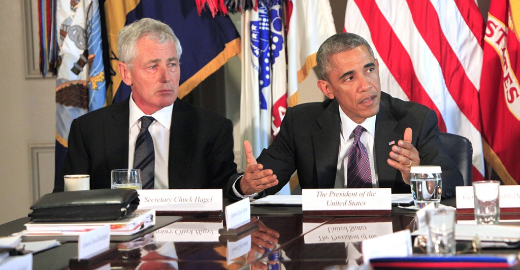 President Obama and Hagela few weeks before his resignation. (Photo: Dennis Brack/Newscom)