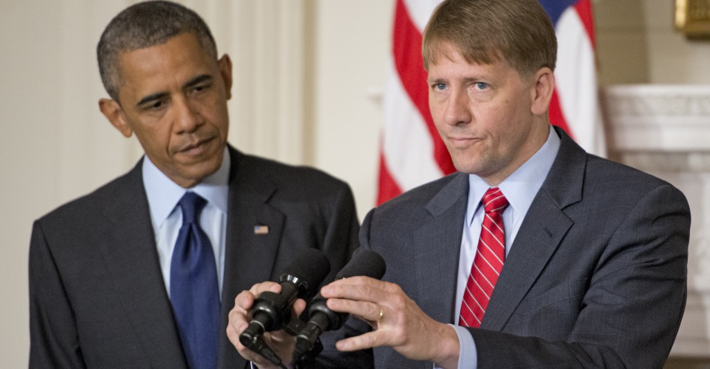 Richard Cordray, director of the Consumer Financial Protection Bureau, and President Obama at a news conference. (Photo: Ron Sachs/Newscom)