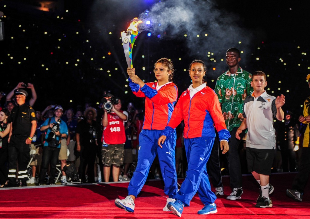 Representatives of players pass the torch during the Opening Ceremony of the Special Olympics World Games. The event gathers over 6,500 athletes from 165 countries and regions, taking part in 25 athletic events. (Photo: Chine Nouvelle/SIPA/Newscom)
