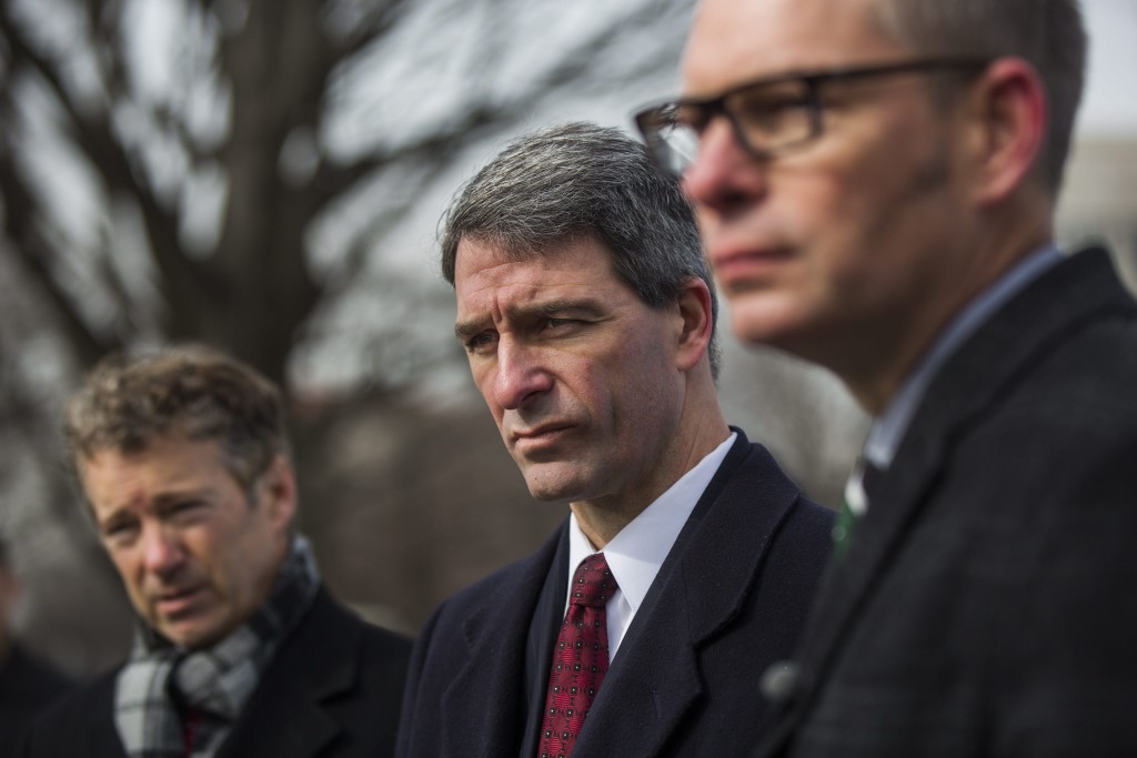 Former Virginia Attorney General Ken Cuccinelli (center), pictured with Sen. Rand Paul, R-Ky., is a leading conservative supporter of criminal justice reform. (Photo: Jim Lo Scalzo/EPA/Newscom)