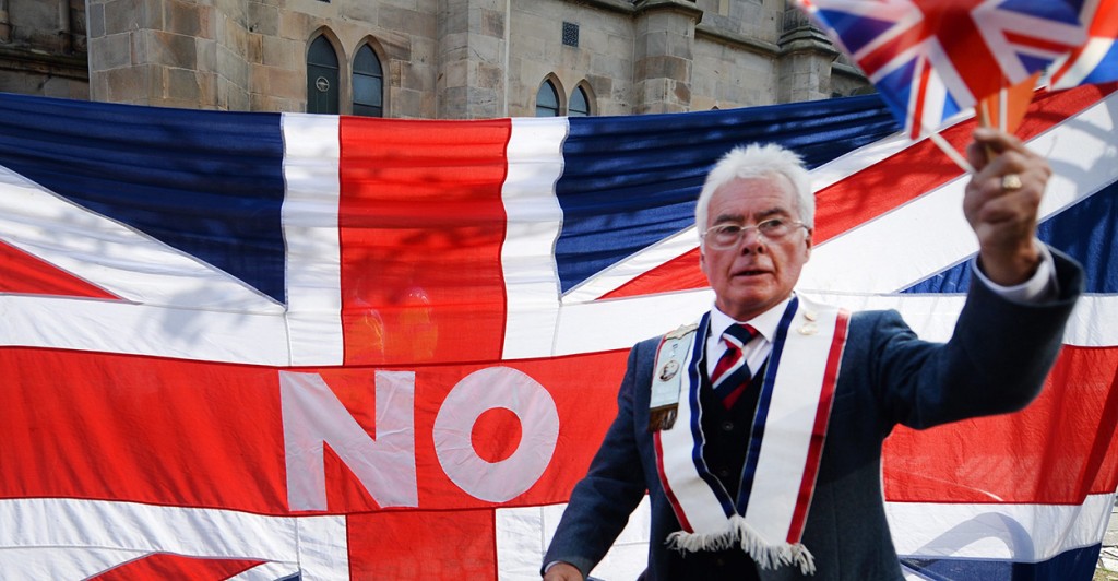 A Unionist waves the Union flag during a march in a show of solidarity for the Union of Britain in Edinburgh, Scotland. Polls are showing that the Yes and No camps are neck and neck in the Scottish Independence referendum. Scots will vote wether Scotland should become an independent country Sept. 18. (Photo: Newscom)