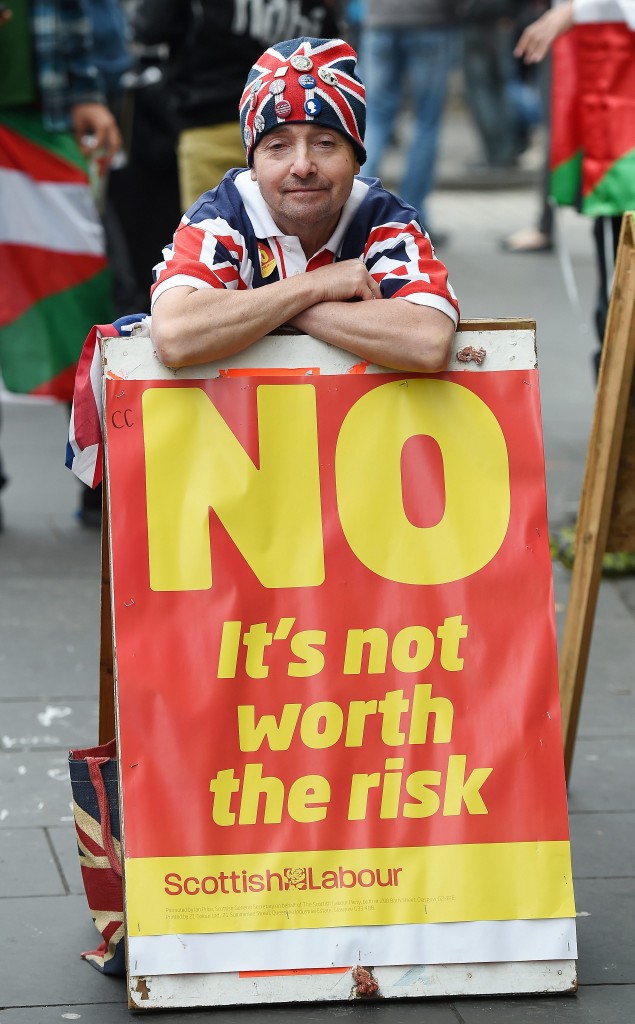 A No supporter campaigns outside a polling station in Edinburgh, Scotland. 