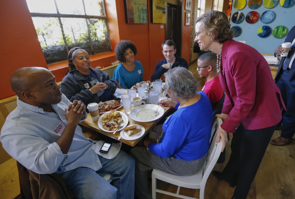 Georgia Democratic  Senate candidate Michelle Nunn greets diners before hosting a roundtable with people impacted by the 2013 government shutdown at the Highland Bakery in Atlanta. (Photo: Newscom)
