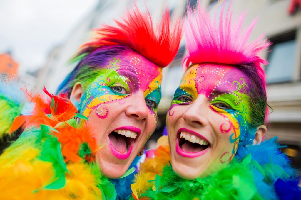 Revelers wearing colorful costumes celebrate the start of the season. (Photo: Newscom)