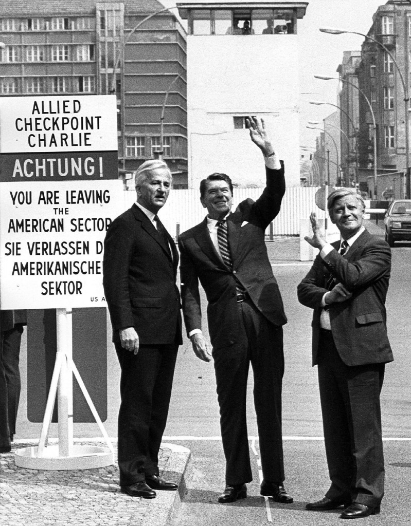 epa01913010 (FILE) A file picture dated 11 June 1982 shows (L-R) then Berlin Mayor Richard von Weizsecker, then US President Ronald Reagan and then German Chancellor Helmut Schmidt at Check Point Charlie in Berlin, Germany.   'Tear down this wall!'. On 12 June 1987, US President Ronald Reagan pronounced these words to Soviet leader Mikhail Gorbachev during a speech at the Brandenburg Gate commemorating the 750th anniversary of Berlin. The Berlin Wall came down two years later on 09 November 1989 and two parts of Germany was reunified after 28 years of separation. The building of the Wall began on 13 August 1961. German Democratic Republic (GDR) armed forces started to seal off the eastern part of the city with road barriers made from barbed wire, to build an 'anti-Fascist protective barrier.' On 09 November 1989, after the spokeperson of German Democratic Republic government Guenter Schabowski announced during a press conference the immediate opening of the inner German border, tens of thousands of GDR citizens flocked to the border crossing points. The Iron Curtain fell. On 09 November 2009 will be the celebration of this historic autumn night, the celebration of the 20th anniversary of the fall of the Berlin Wall.  EPA/DIETER HESPE    B/W ONLY (Newscom TagID: epaphotosfour391456.jpg) [Photo via Newscom]