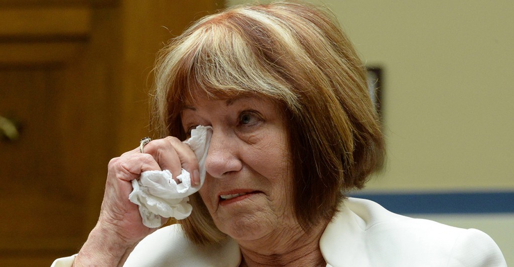 Patricia Smith, mother of American Sean Smith who was killed in the Benghazi attack, wipes away tears while testifying during the US House Oversight and Government Reform Committee hearing on 'Reviews of the Benghazi Attacks and Unanswered Questions', on Capitol Hill September 10, 2013. (Photo: Michael Reynolds/Newscom)