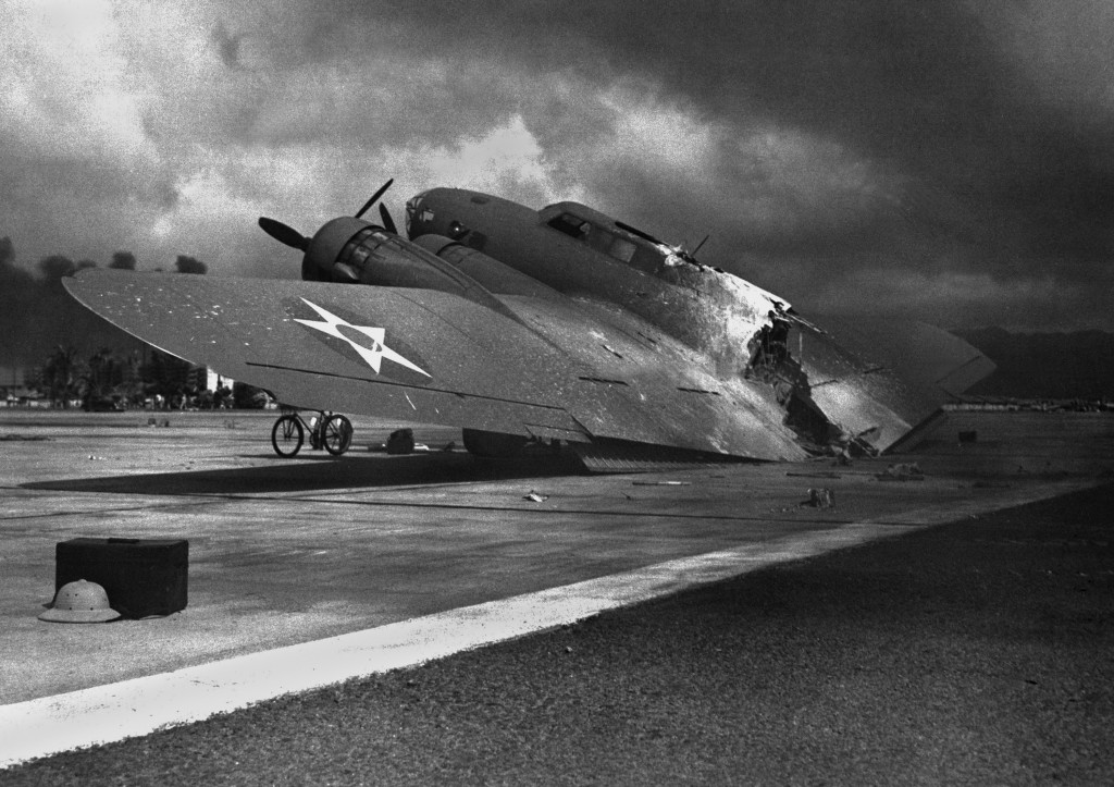 Ruins of a B-17C aircraft rests near Hickam Field after the attack. Nearly half of the approximately 60 airplanes at Hickam Field had been destroyed or severely damaged. (Photo: Newscom)
