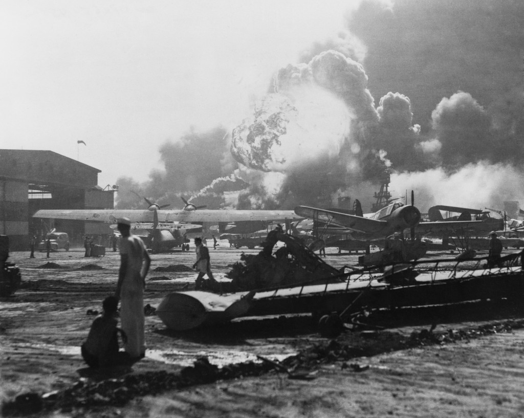 Explosion at Pearl Harbor seen from Hickam Field. Hickam Field suffered extensive damage and aircraft losses, with 189 people killed and 303 wounded. (Photo: Newscom)