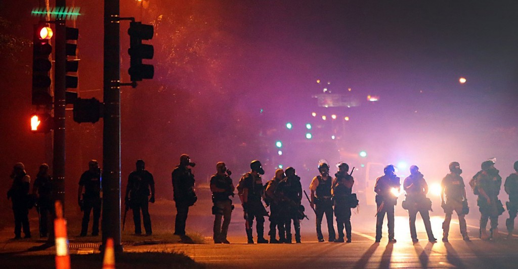 Tactical officers on the evening of Aug. 13 work their way north on West Florissant Avenue in Ferguson, Mo. (Photo: Robert Cohen/St. Louis Post-Dispatch/MCT) 