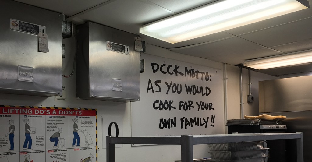 The D.C. Central Kitchen motto hangs in the kitchen. (Photo: Madaline Donnelly/The Daily Signal)