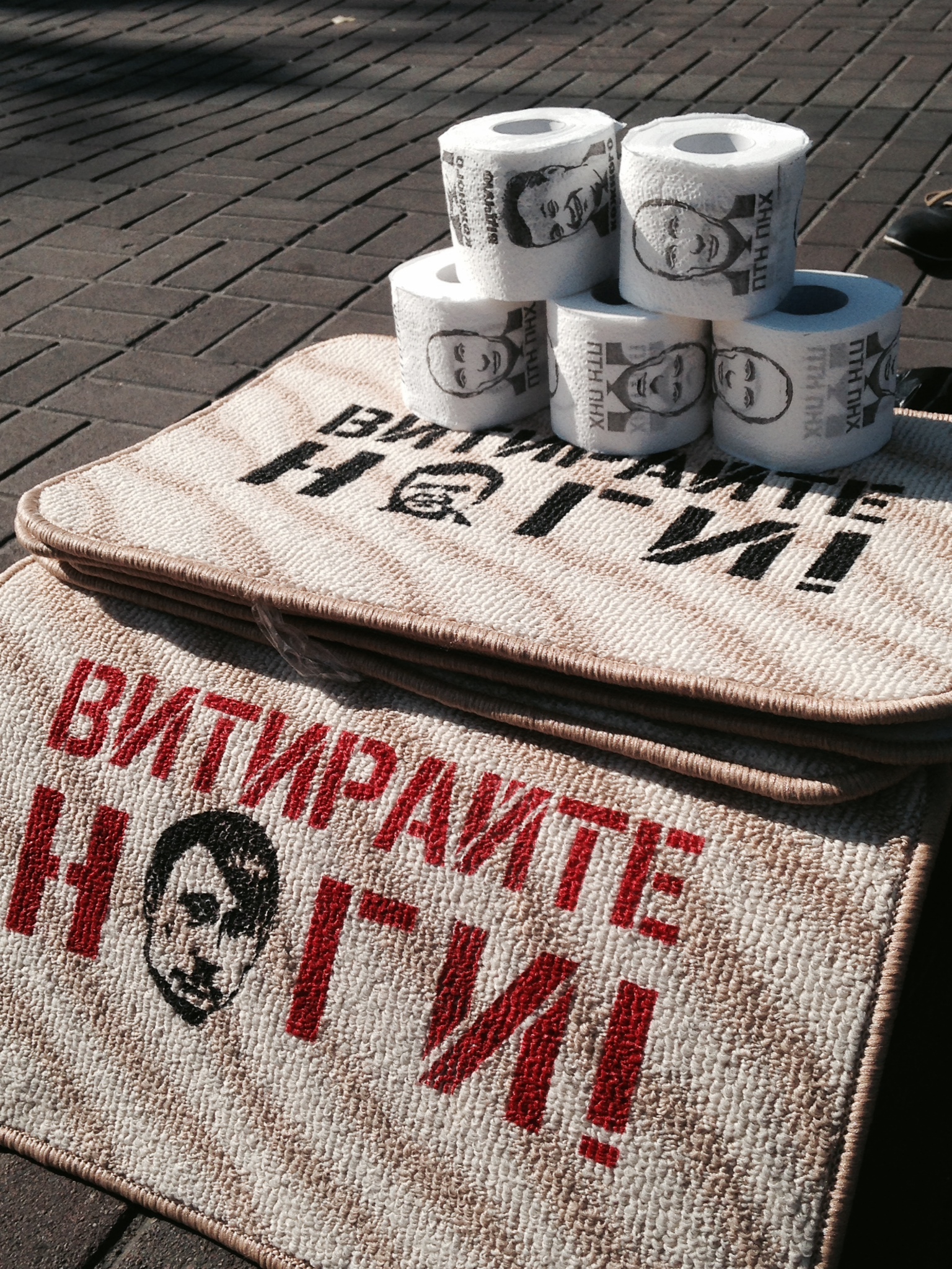 Depictions of Russian President Vladimir Putin for sale on Kyiv’s Independence Square. (Photo: Nolan Peterson/The Daily Signal)
