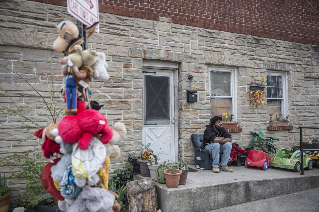 Residents of West Baltimore continue to live their lives after the death of Freddy Gray caused unrest in the city. (Photo: Robert Stolarik/Polaris/Newscom) 