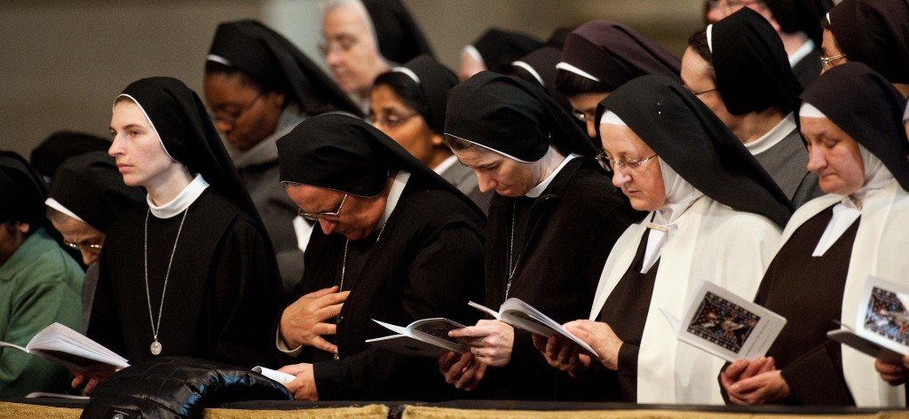 Nuns from around the world pray together during the opening mass. (Photo: Massimiliano Migliorato/Newscom)