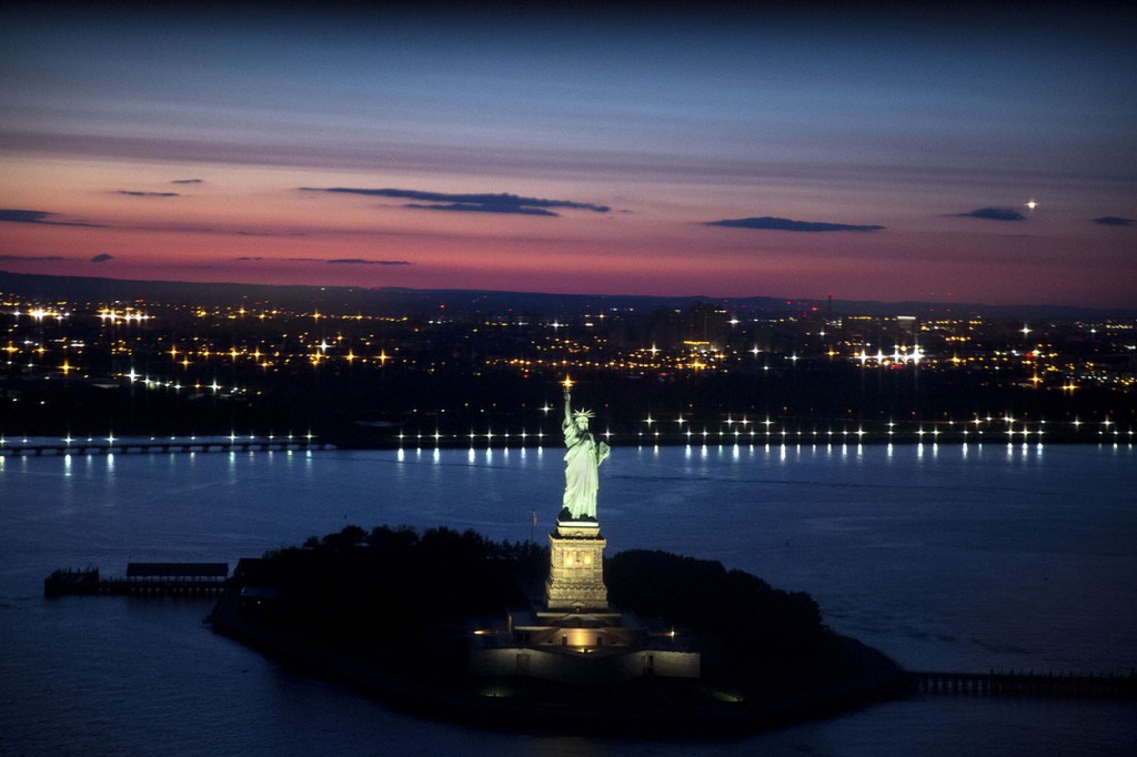 The Statue of Liberty is pictured during the flight to John F. Kennedy International Airport in New York, N.Y., July 17, 2014. (Official White House Photo by Pete Souza)This official White House photograph is being made available only for publication by