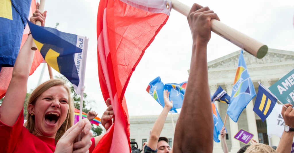 Demonstrators celebrate the U.S. Supreme Court ruling legalizing same-sex marriage. (Photo: Bill Clark/CQ Roll Call/Newscom)