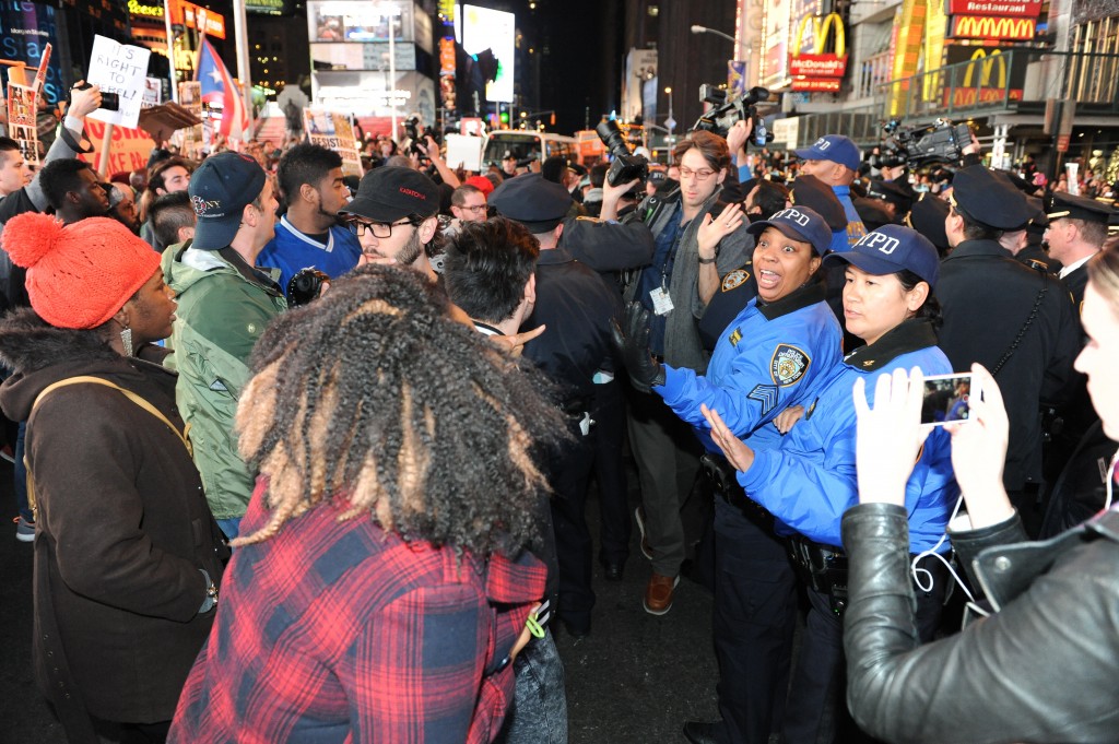 A large group of protesters demonstrating in Times Square. (Photo: Christopher Sadowski/Newscom)