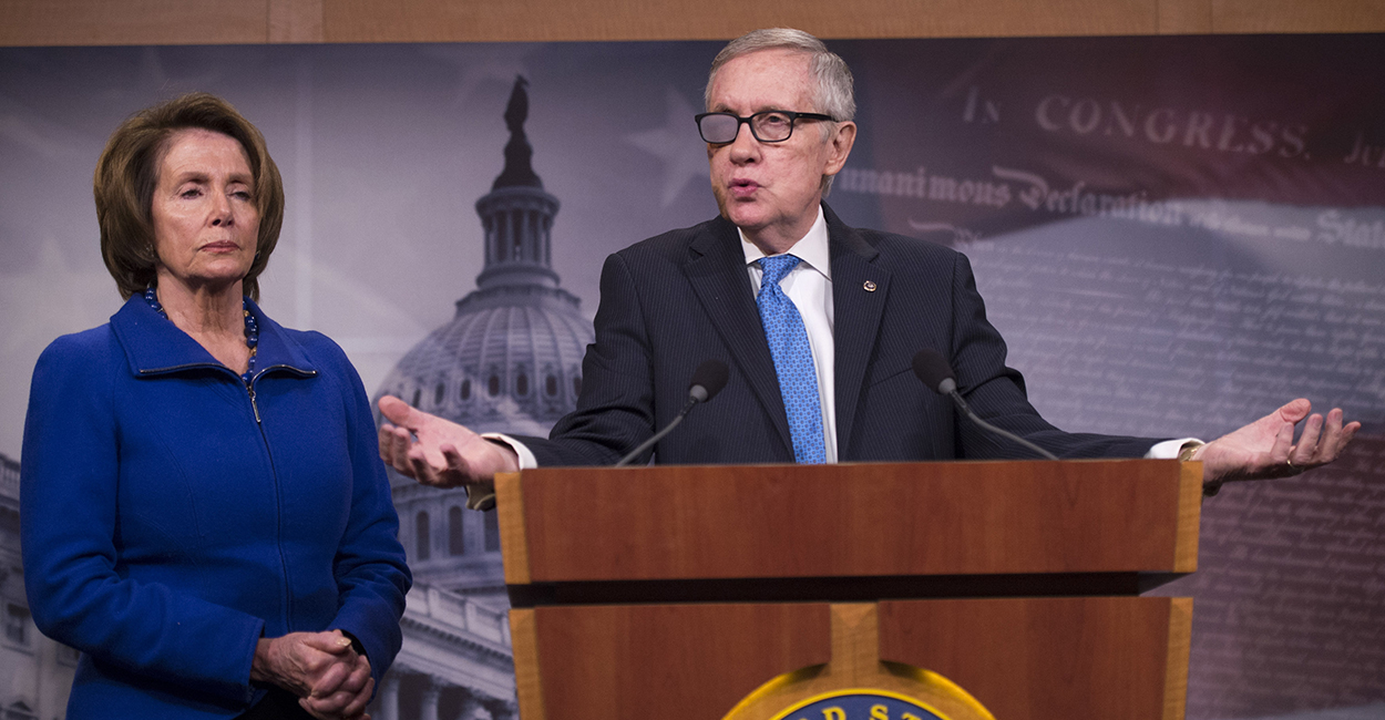 Senate Majority Leader Harry Reid and House Minority Leader Nancy Pelosi speak on the DHS funding debate Feb. 26. (Photo: Kevin Dietsch/UPI/Newscom)