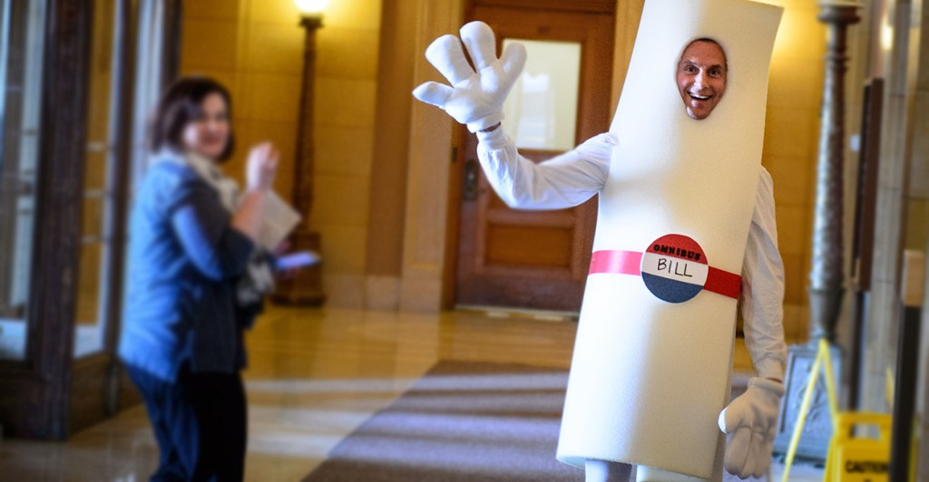 Mark Manion, director of Retirement Services at Minnesota State Retirement System came to the Capitol dressed as the Omnibus Tax Bill  during a staff information session in April. (Photo: Glen Stubbe/Minneapolis Star Tribune/Newscom)