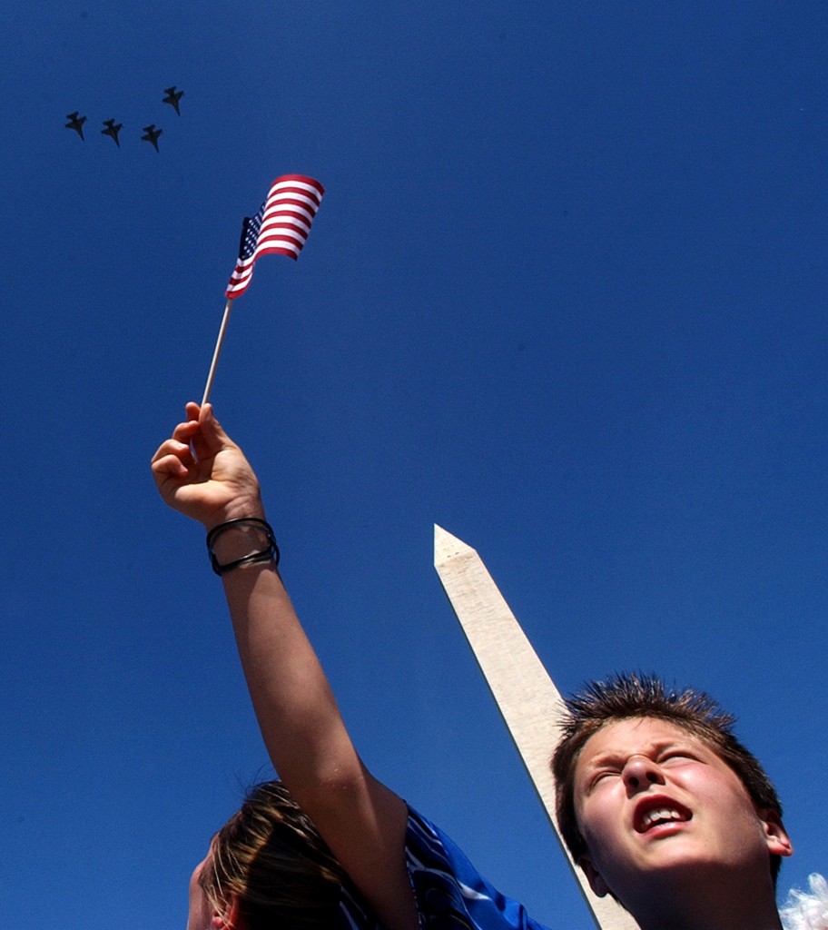 An Air Force flyover helps conclude the World War II Memorial dedication ceremony in 2004. (Photo: Bahram Mark Sobhani/San Antonio Express-News/Newscom)