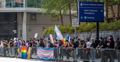 LGBT and transgender activists in front of Boston Children's Hospital