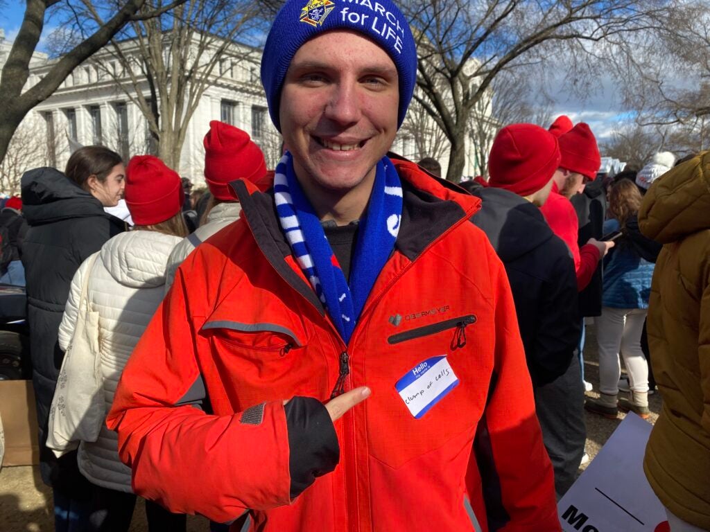 man wears March for Life hat at the March for Life