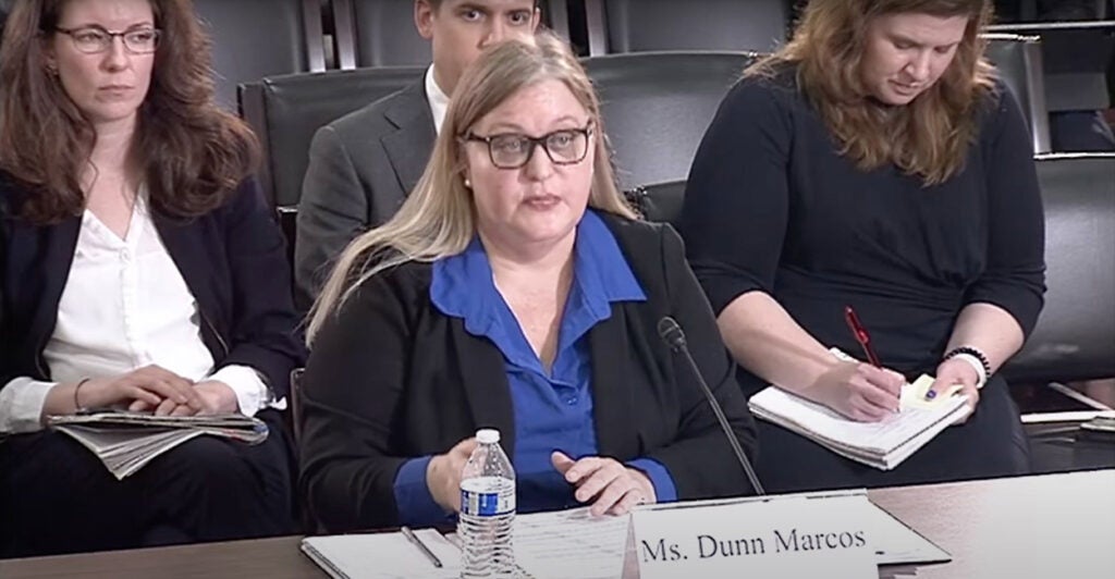 “I have always promised to hold the powerful to account regardless of political party,” Porter told Robin Dunn Marcos, director of the Office of Refugee Resettlement under the Department of Health and Human Services sits before members of Congress wearing a blue top and black blazer.