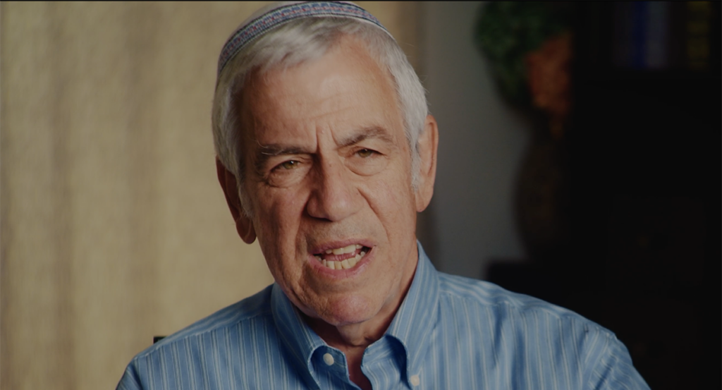 Israeli man David Rubin in a blue striped dress shirt wearing a kippa