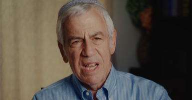 Israeli man David Rubin in a blue striped dress shirt wearing a kippa