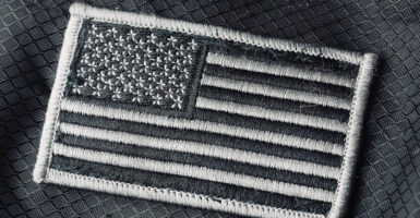 A flag patch on a military uniform.