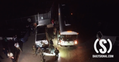 Illegal immigrants loaded onto buses on the U.S. side of the southern border.