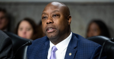 Scott speaks at a hearing