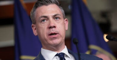 Authorities have charged a man with intimidating and harassing a United States congressman after the man threatened the lives of Republican Indiana Rep. Jim Banks and his daughters. Pictured: Banks speaks at a House Republican news conference on energy policy at the U.S. Capitol on March 08, 2022 in Washington, DC. The Republicans said they support Biden's ban on Russian oil imports but urged for increase domestic production to help curb high gas prices. (Photo by Kevin Dietsch/Getty Images)