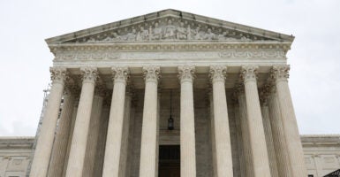 The pillars and top of the Supreme Court building in Washington, D.C.