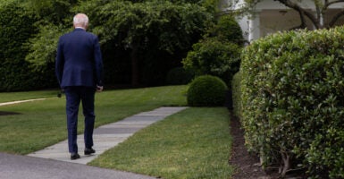 Joe Biden walking away from camera