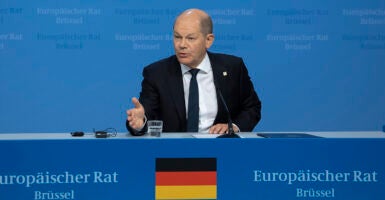 German Chancellor Olaf Scholz talks to the media at a press conference