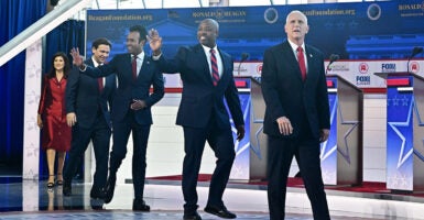 GOP presidential candidates walk onto the debate stage.