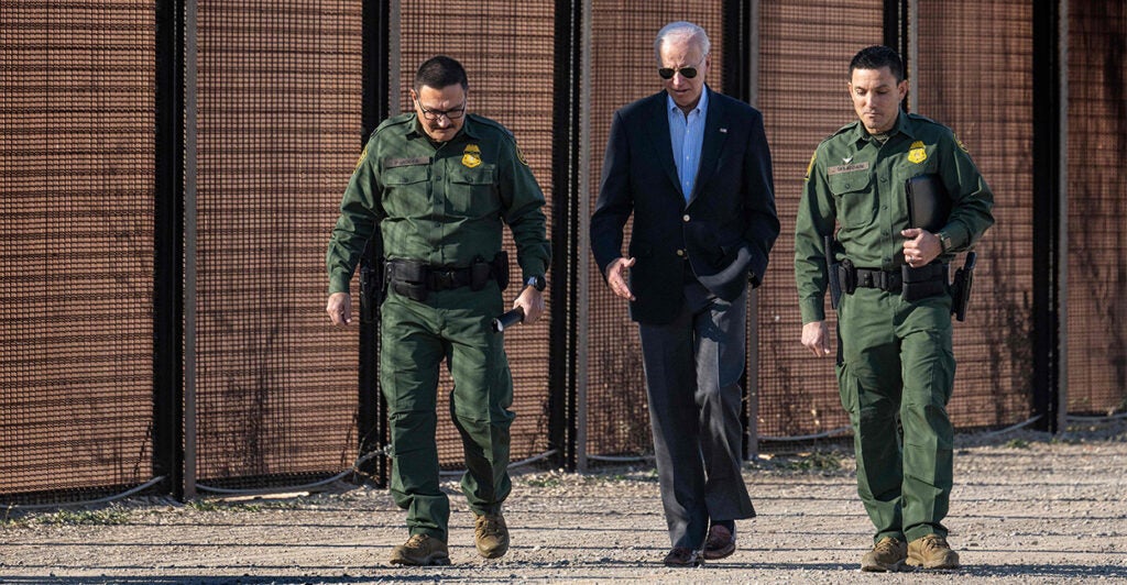 President Joe Biden speaks with U.S. Customs and Border Protection officers as he visits the U.S.-Mexico border