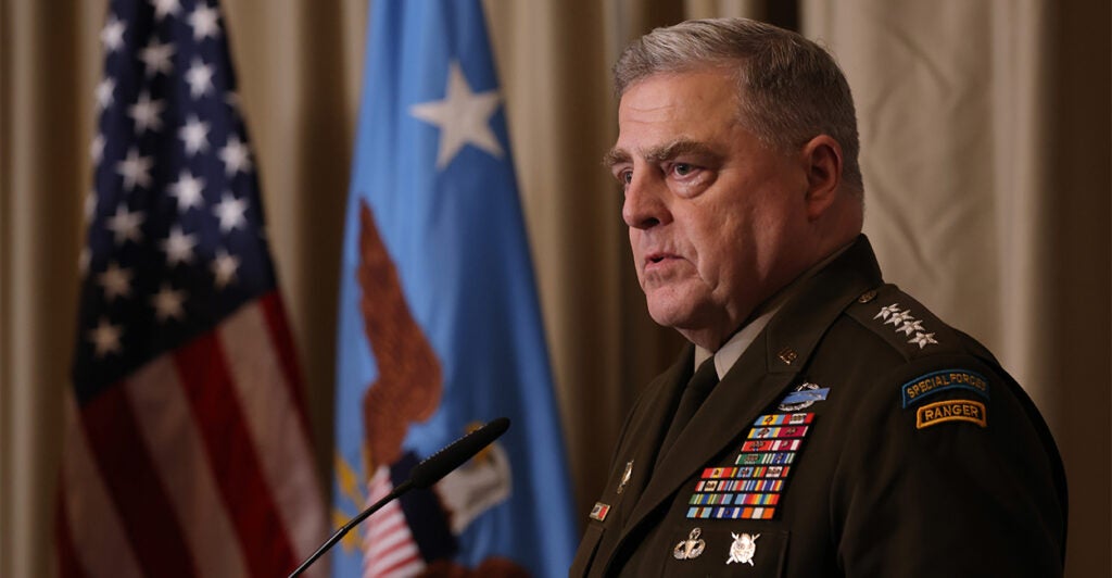 Chairman of the Joint Chiefs of Staff Mark Milley speaks at a podium in front of the American flag