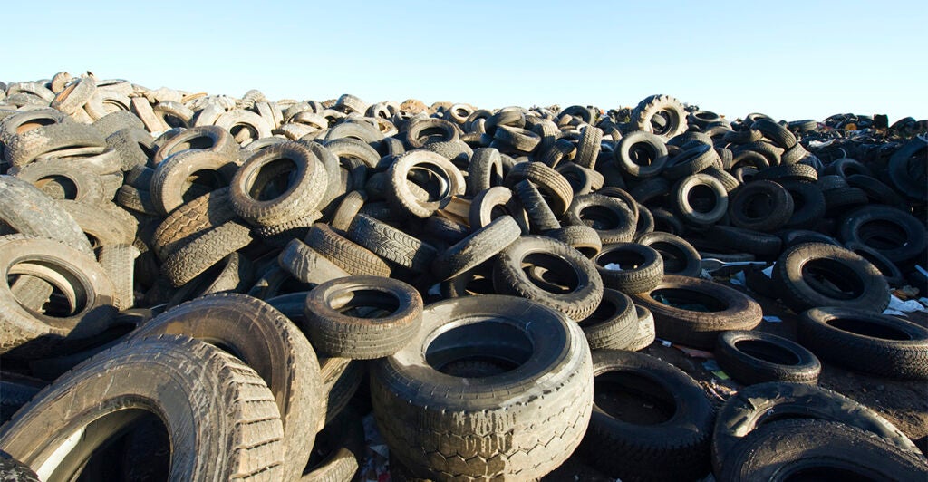 A large pile of used tires