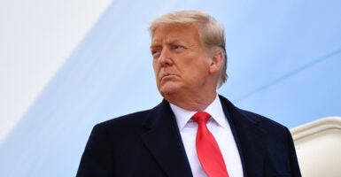 Former President Donald Trump is the candidate that would give the Republican party the best shot at winning the 2024 election, 37% of Americans said in a new poll. Pictured: Trump boards Air Force One before departing Harlingen, Texas on January 12, 2021. (Photo by MANDEL NGAN/AFP via Getty Images)