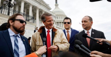 Reps. Eli Crane, Tim Burchett, Matt Gaetz, and Bob Good talk to reporters outside the U.S. Capitol