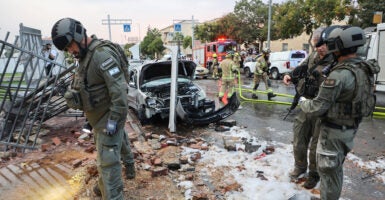 Israeli forces clean up debris in the aftermath of Oct 7 terrorist attacks