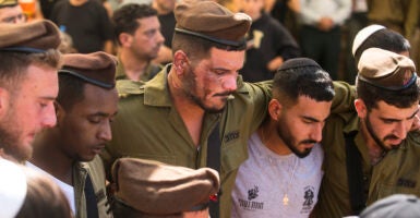 Israeli soldiers mourn the loss of an IDF comrade