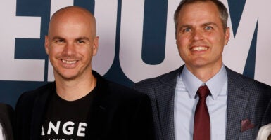 Brothers Jeff and Neal Harmon stand together and smile for the camera at the "Sound of Freedom" premier.